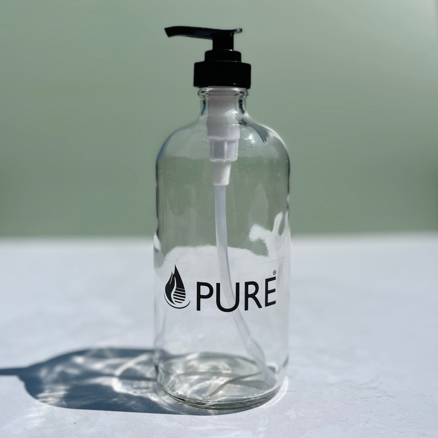 Bouteille pompe en verre