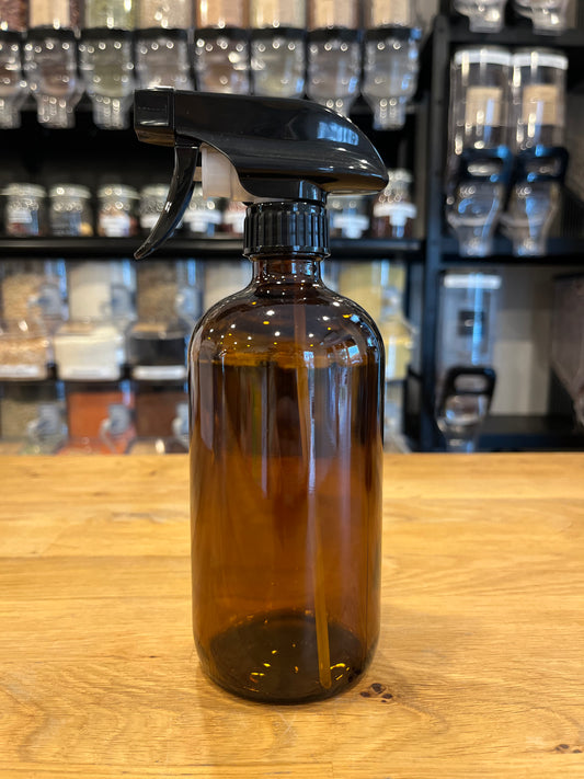 Bouteille vide en verre ambré